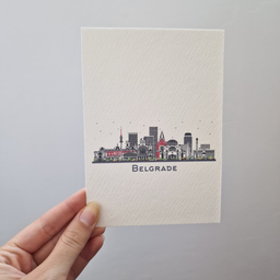 Bela art kartica sa ilustracijom panorame Beograda i natpisom Belgrade