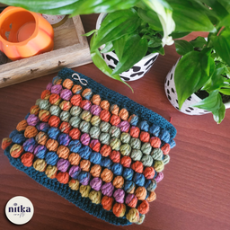 Heklana neseser torbica zeleno šarena