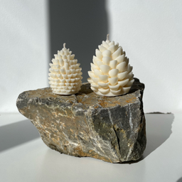 2 sveće: mala i velika šišarka